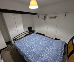 There are shelves above the wardrobe 